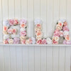 Flower Wall with Name Sign