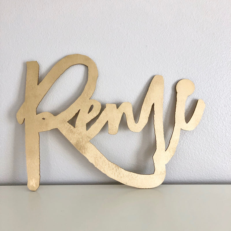 gold name sign wooden sign
